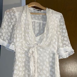 Faux wrap bell sleeve top